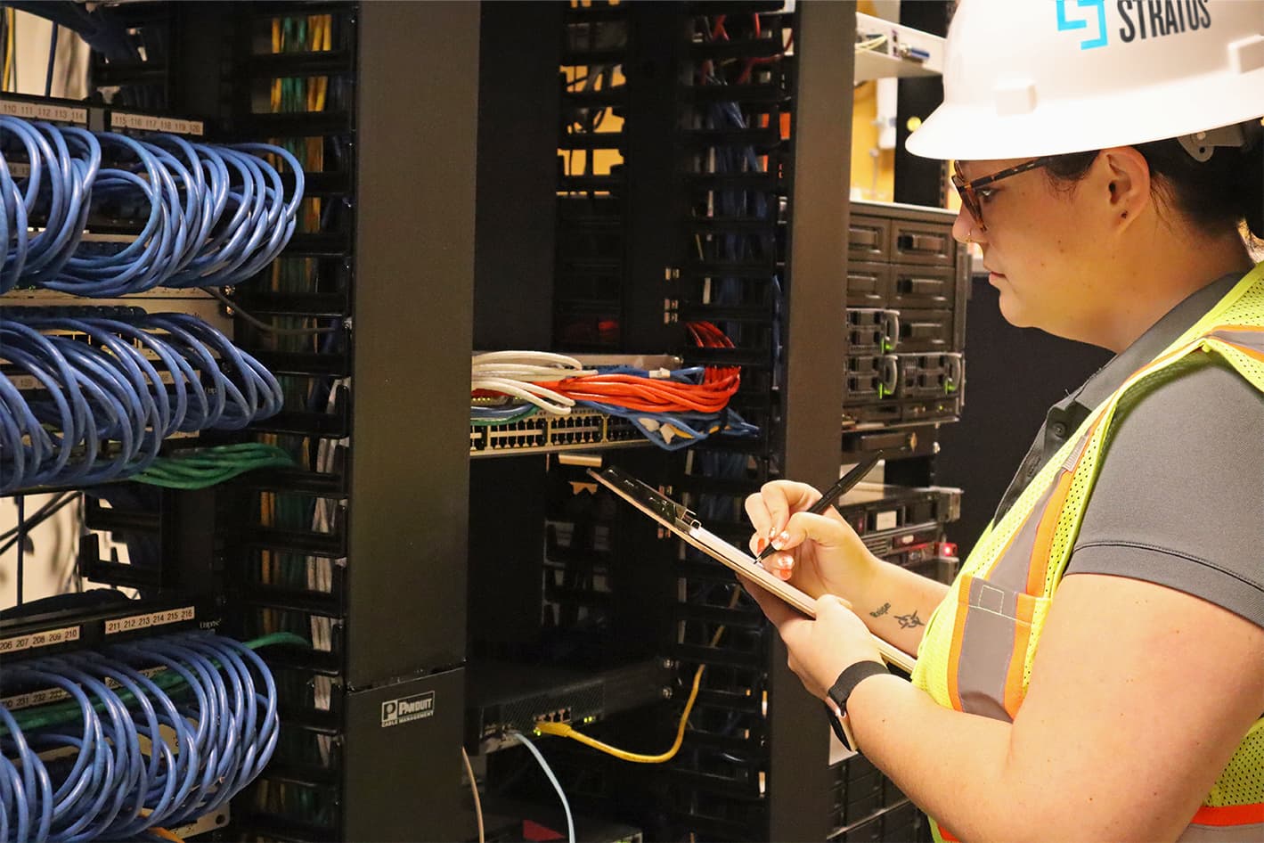 commissioning services professional engineer writing on clipboard